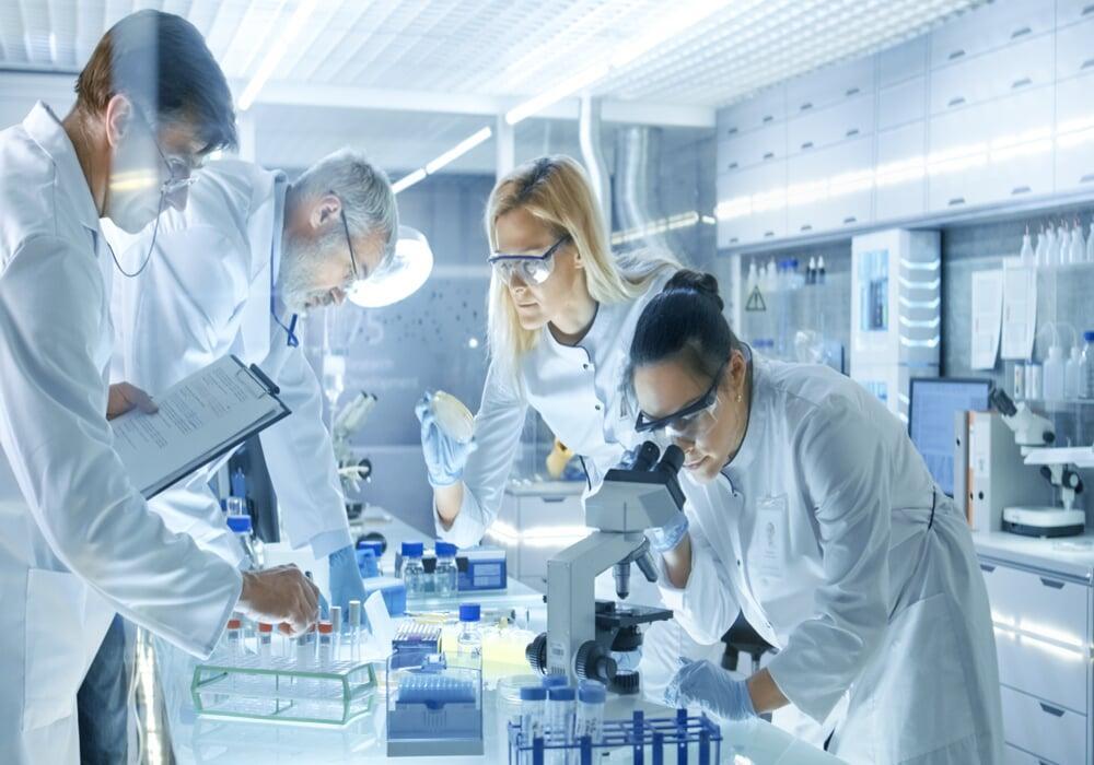 Scientists working in a laboratory, representing product formulation support.